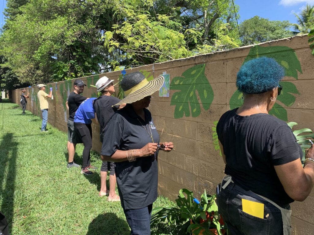 South Miami painting the Unity Wall with Gail Alexander
